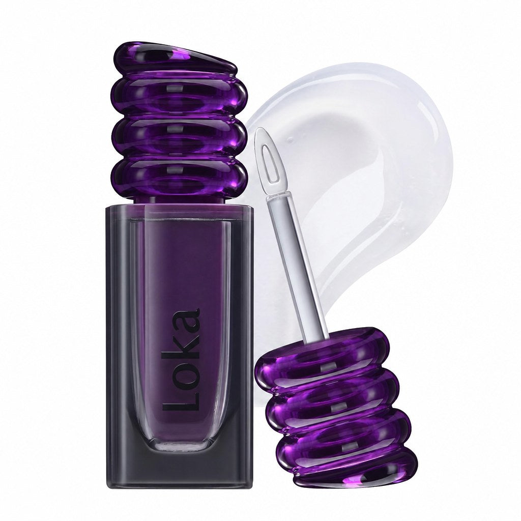 Loka Magic Lip Fixer tube with steel applicator and clear gloss swatch