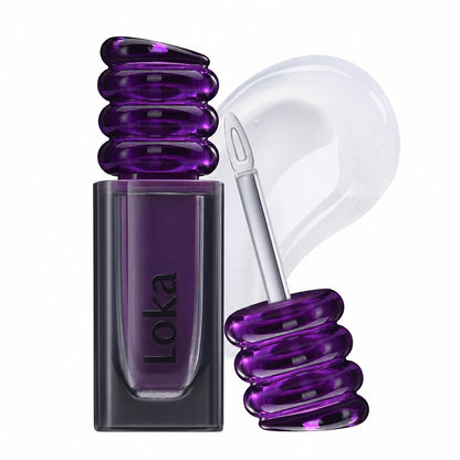 Loka Magic Lip Fixer tube with steel applicator and clear gloss swatch